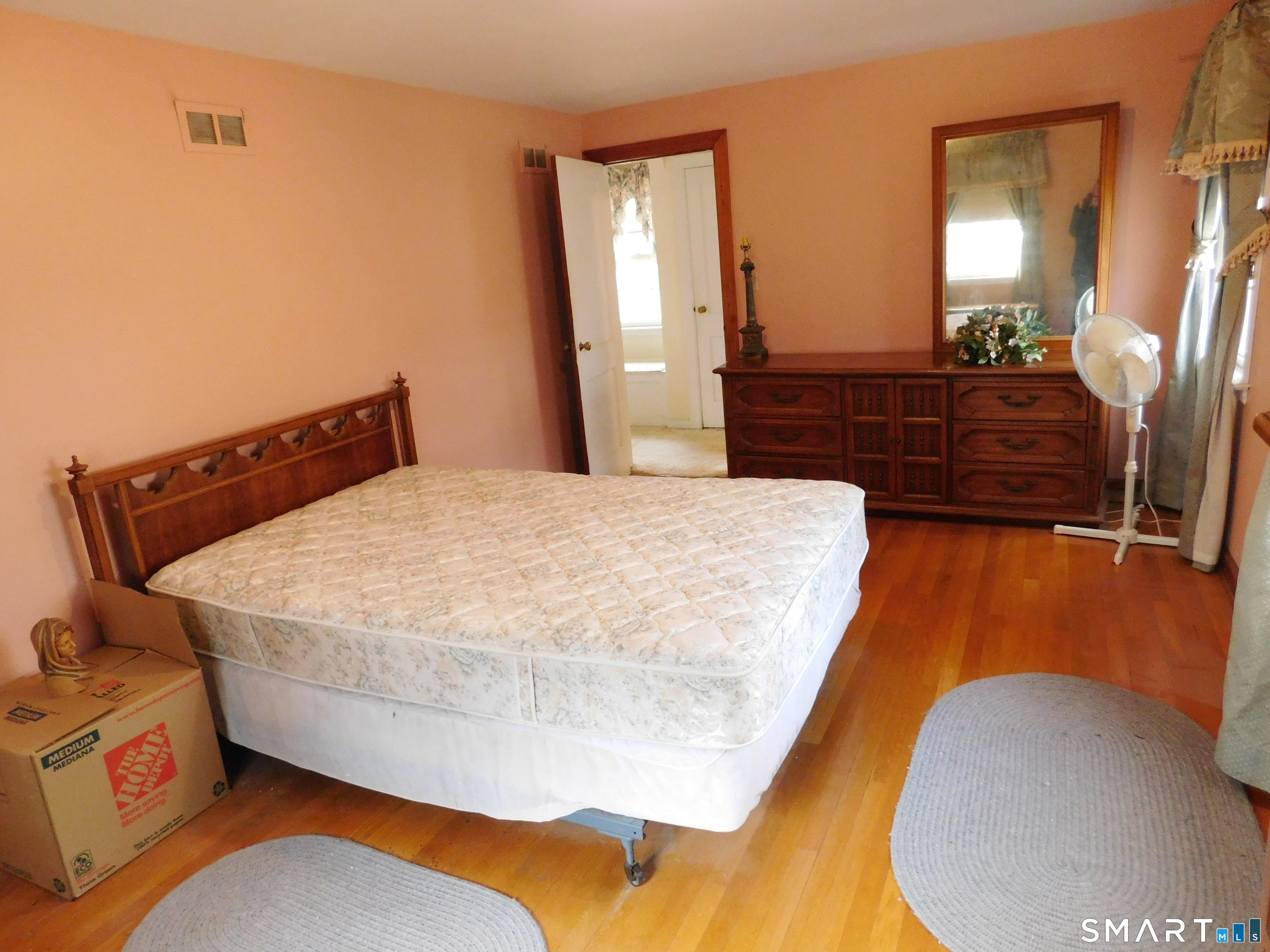 60 E Street Derby, CT 06418 - Photo 21 of 31 a bedroom with a bed and mirror