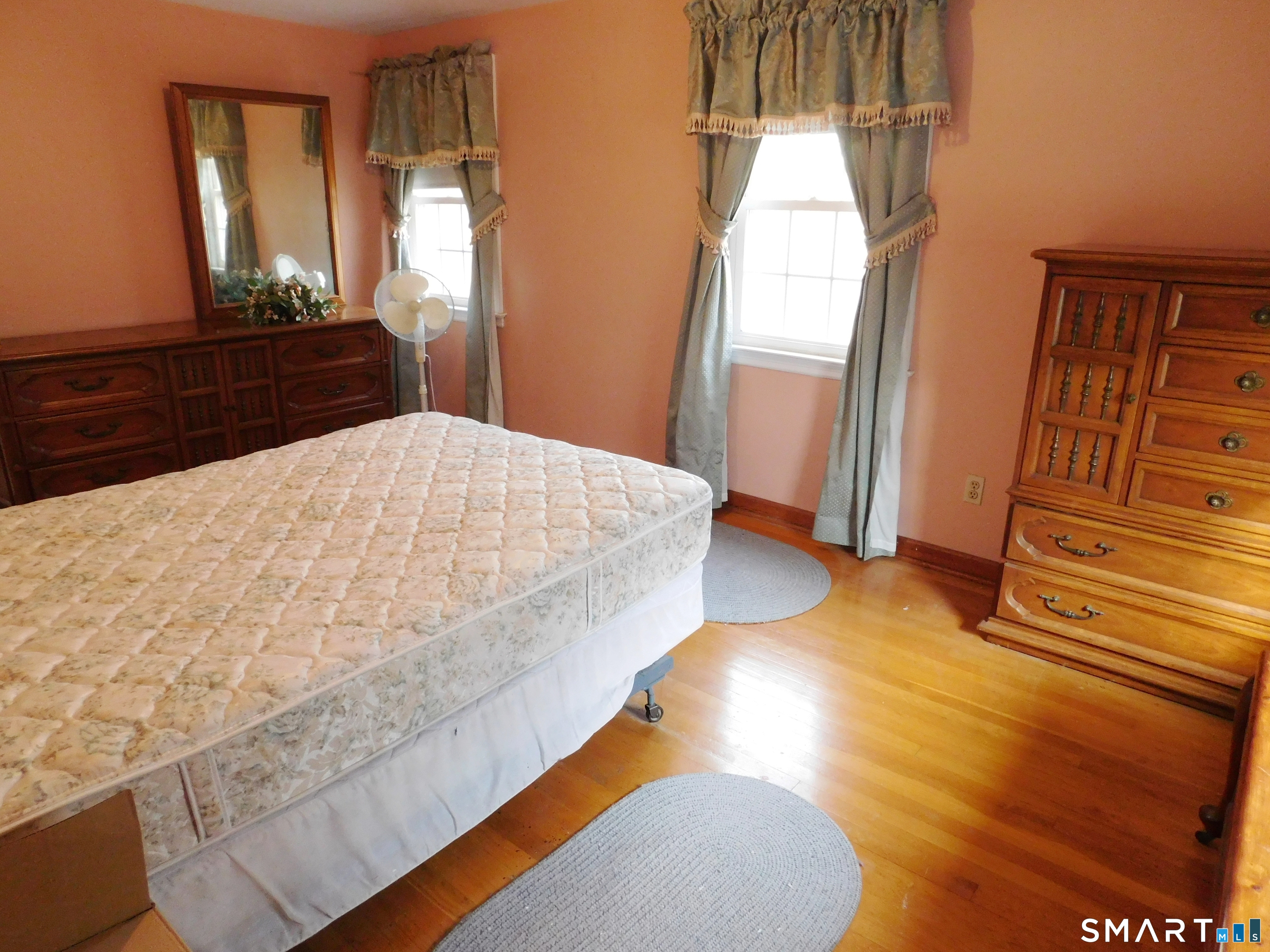 60 E Street Derby, CT 06418 - Photo 22 of 31 a bedroom with a bed and a dresser