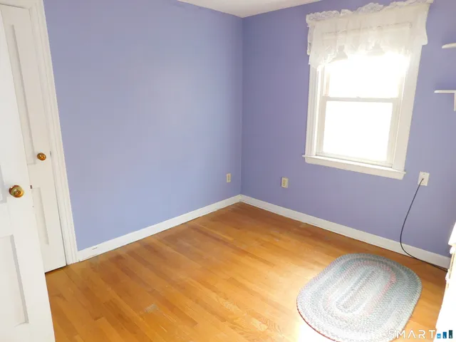 a view of a room with windows