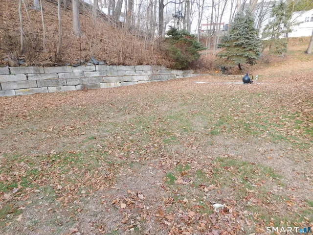 a view of yard covered with snow