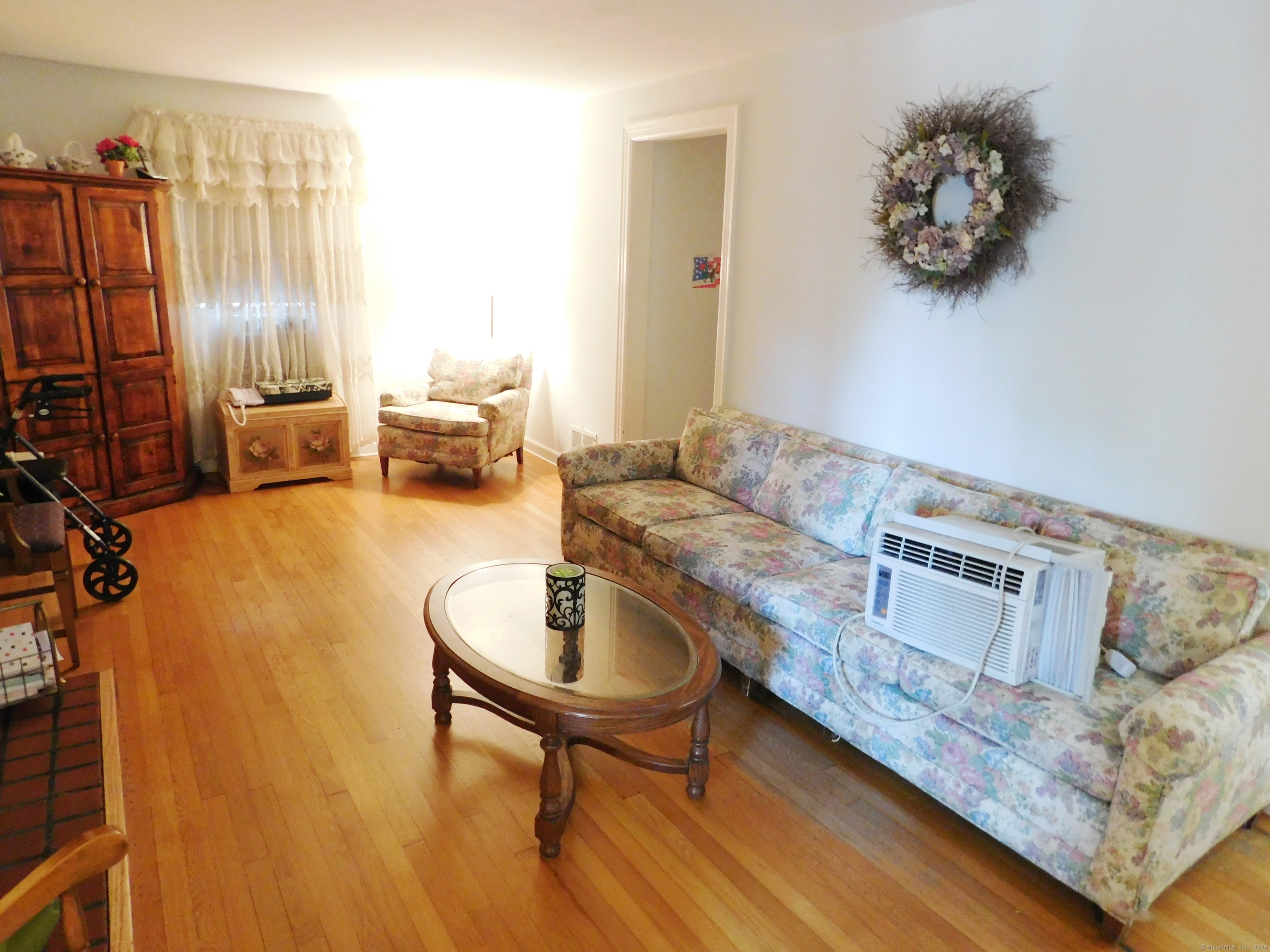 60 E Street Derby, CT 06418 - Photo 4 of 31 a living room with furniture and a couch
