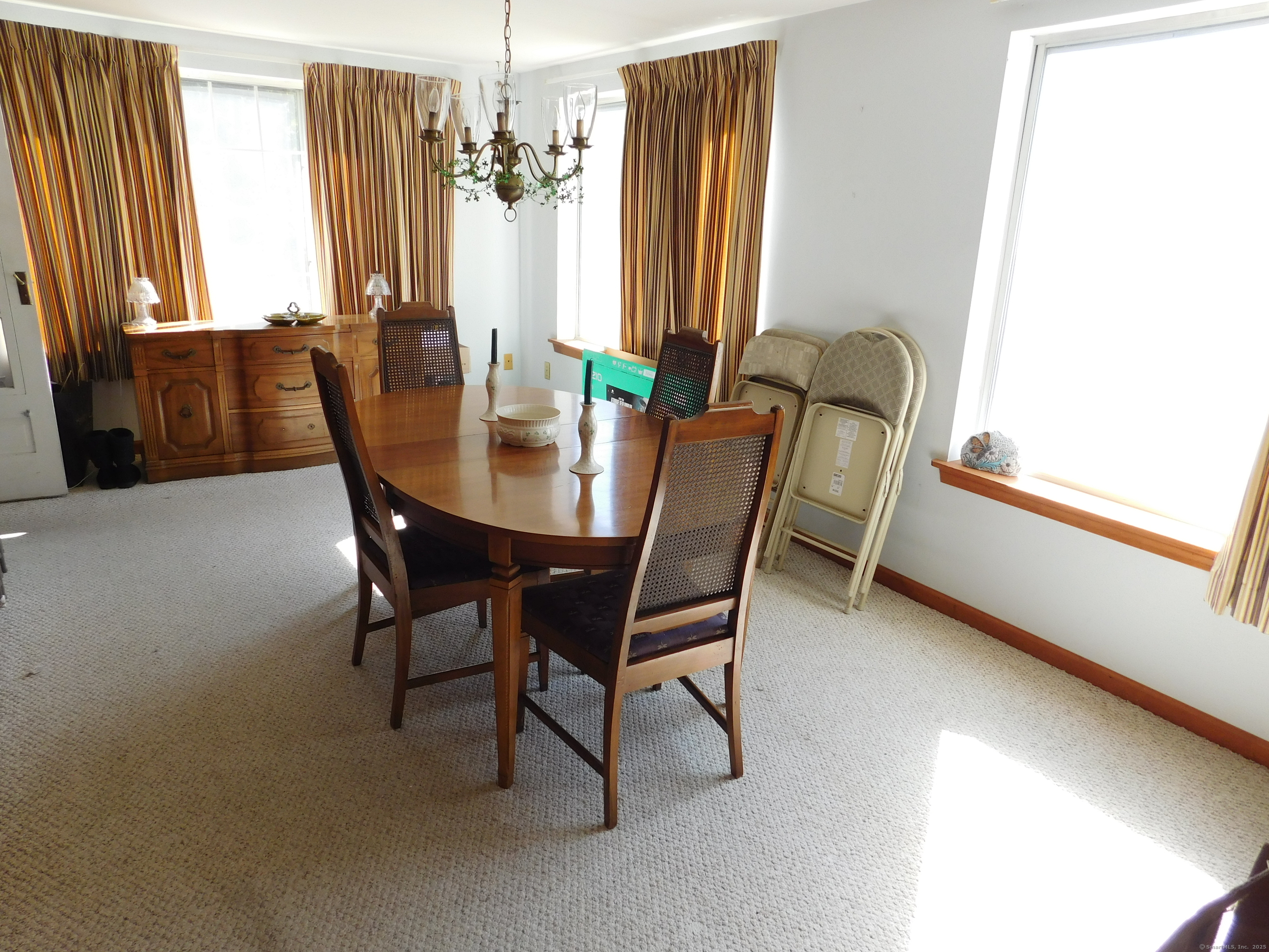 60 E Street Derby, CT 06418 - Photo 6 of 30 a view of a dining room with furniture and a window