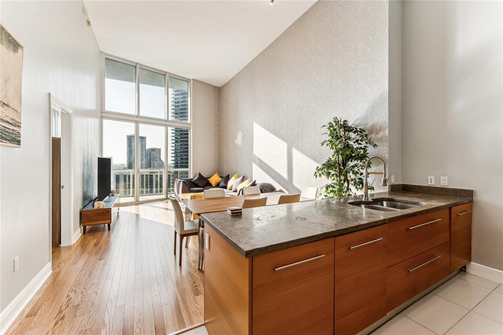 a kitchen with sink and window