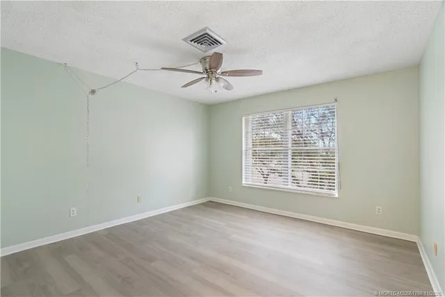 a view of a swimming pool with a deck