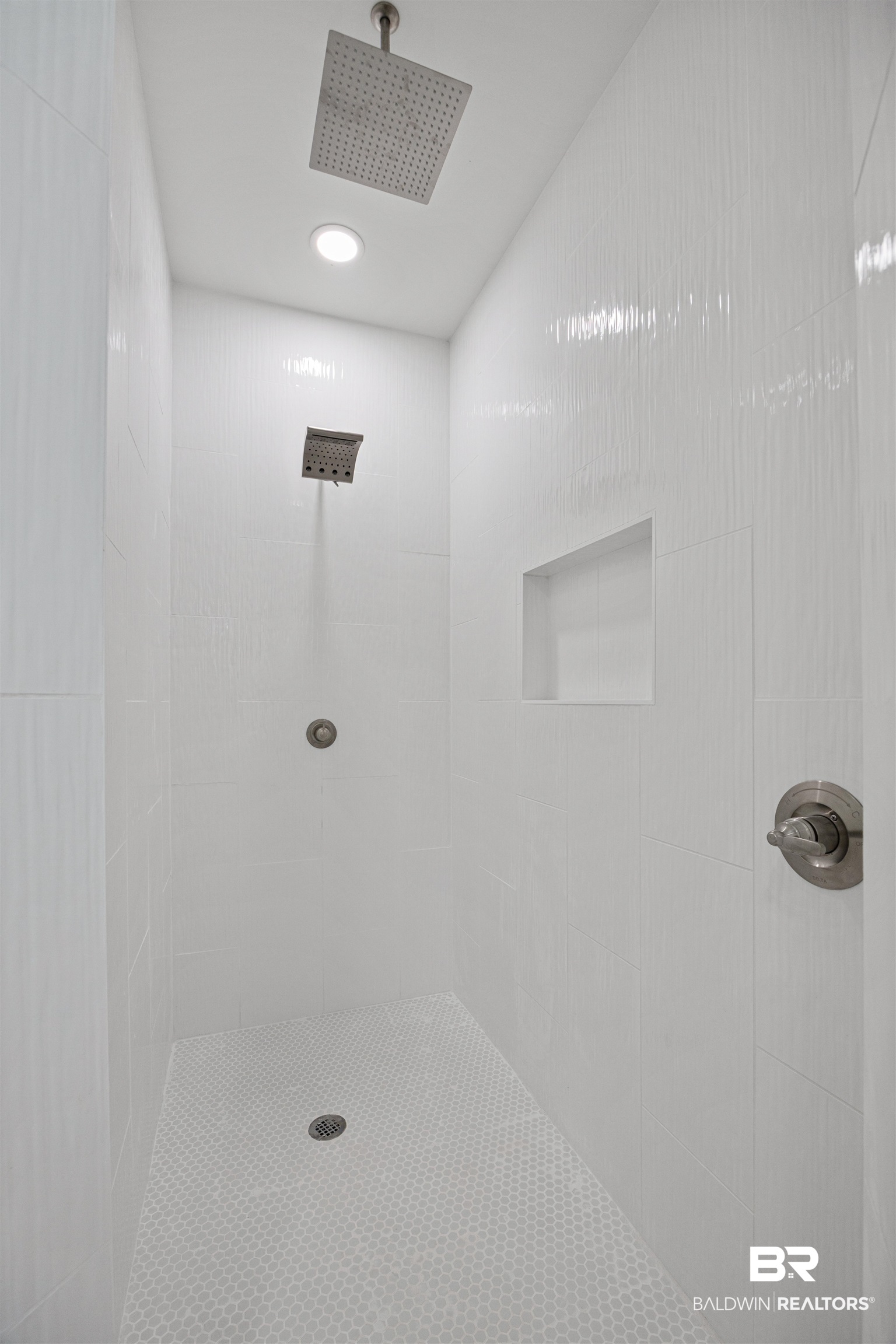 27591 Canal Road Orange Beach, AL 36561 - Photo 28 of 51 Bathroom with a tile shower and recessed lighting
