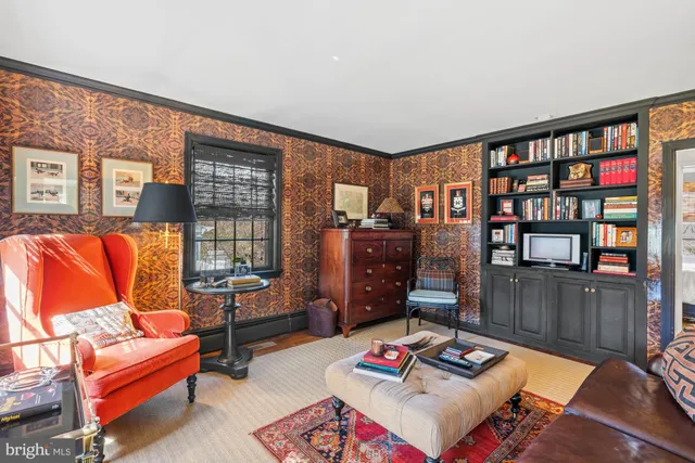 a kitchen with stainless steel appliances granite countertop a stove a sink dishwasher a microwave oven with cabinets and wooden floor