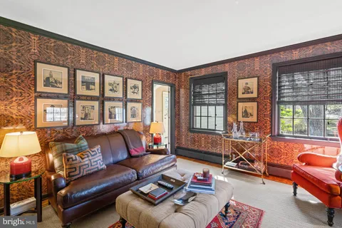 a kitchen with stainless steel appliances granite countertop a stove top oven a sink and cabinets