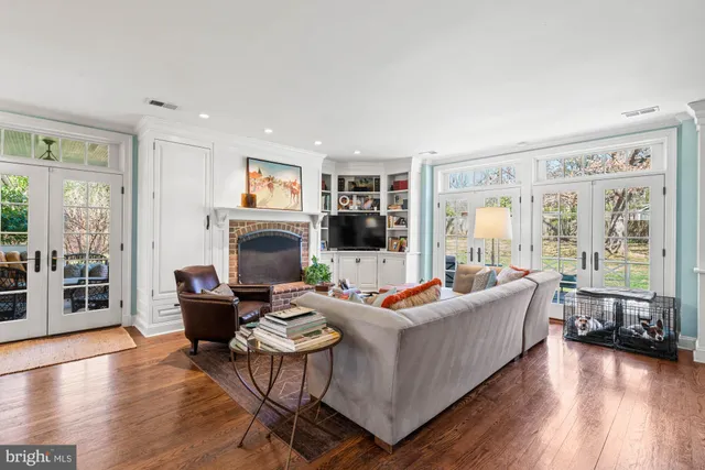 a bathroom with a granite countertop sink mirror and shower