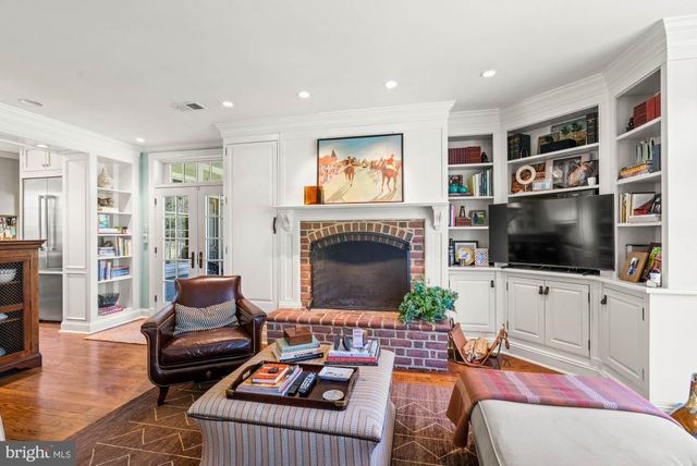 a bed room with a bed and a dresser