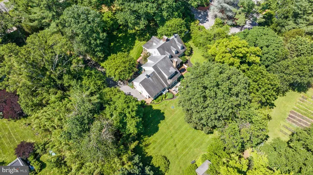 a backyard of a house with lots of green space