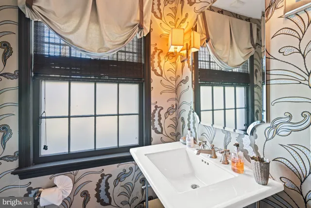 a front view of a house with a yard and porch