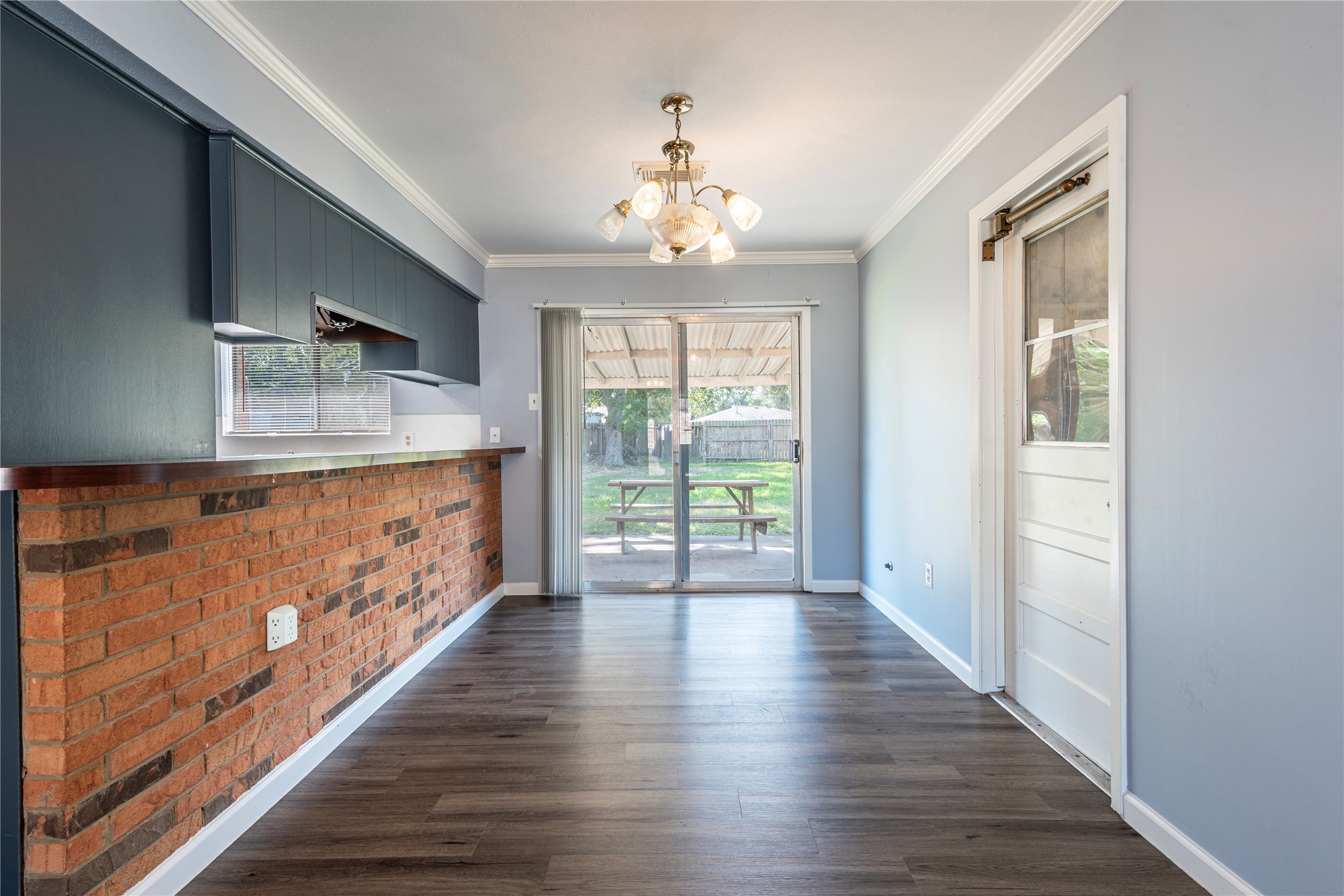 10914 Keese Drive Houston, TX 77089 - Photo 11 of 22 wooden floor in an empty room with a window