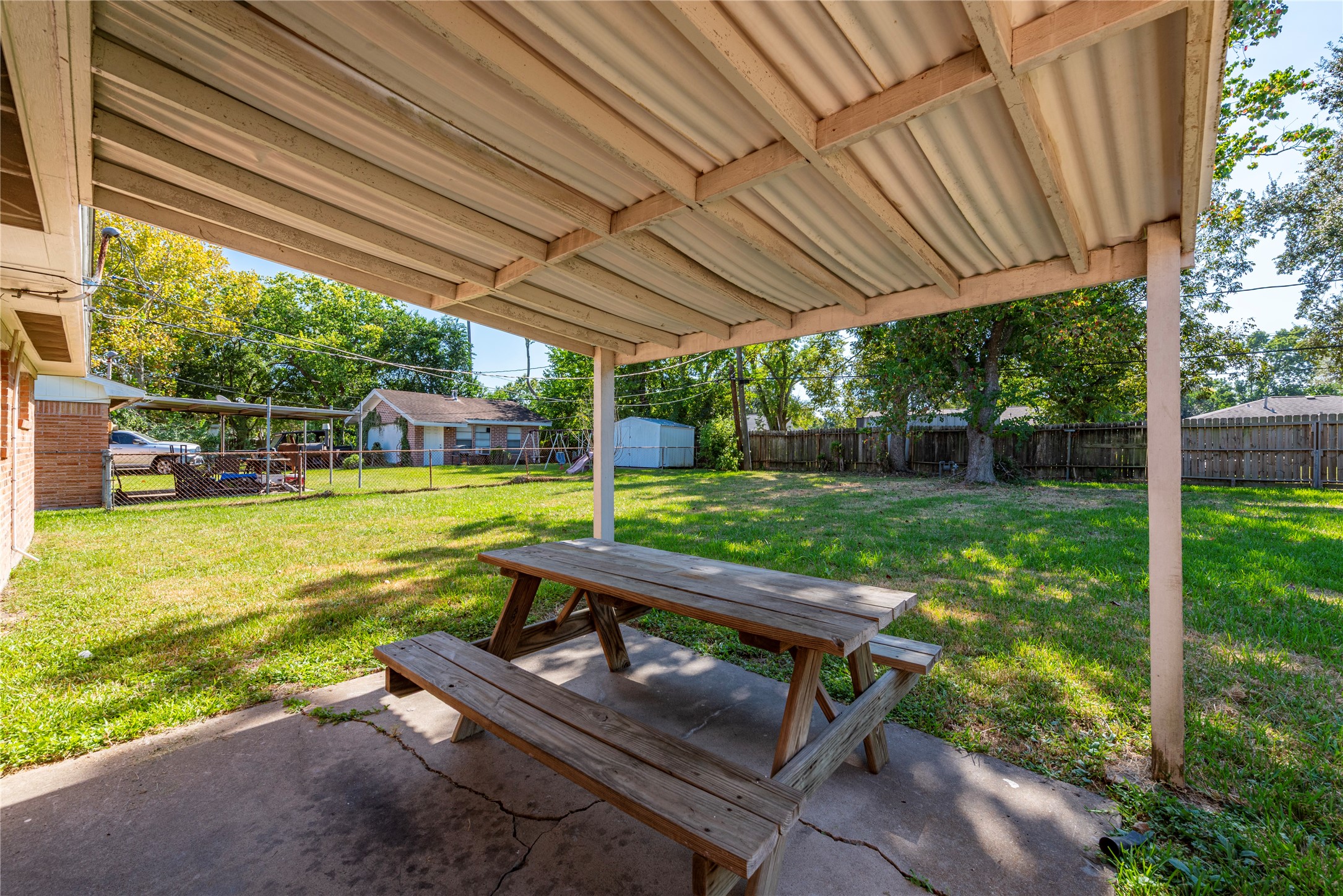 10914 Keese Drive Houston, TX 77089 - Photo 4 of 22 a view of a sitting area with furniture in backyard