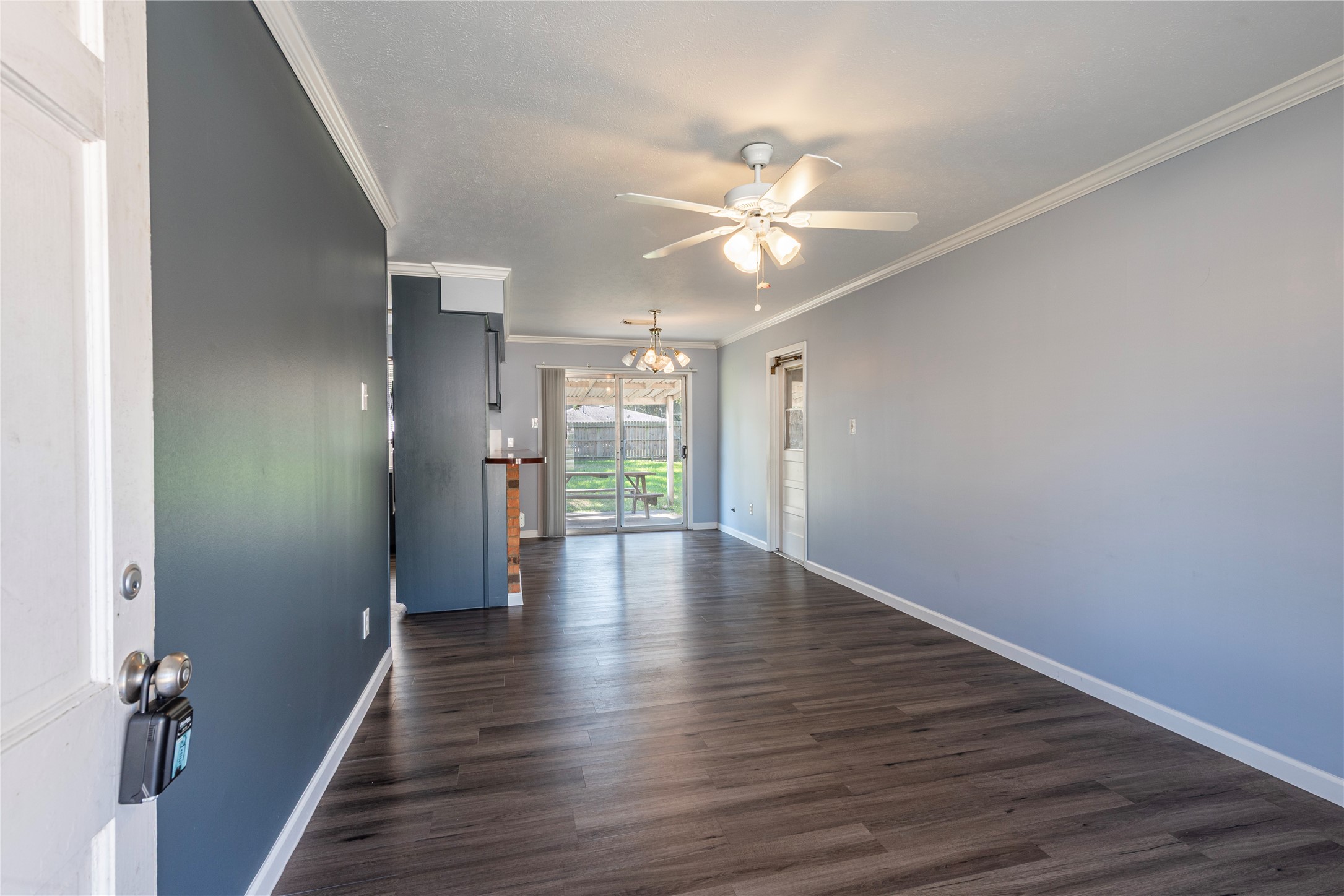 10914 Keese Drive Houston, TX 77089 - Photo 8 of 22 a view of a hallway with wooden floor
