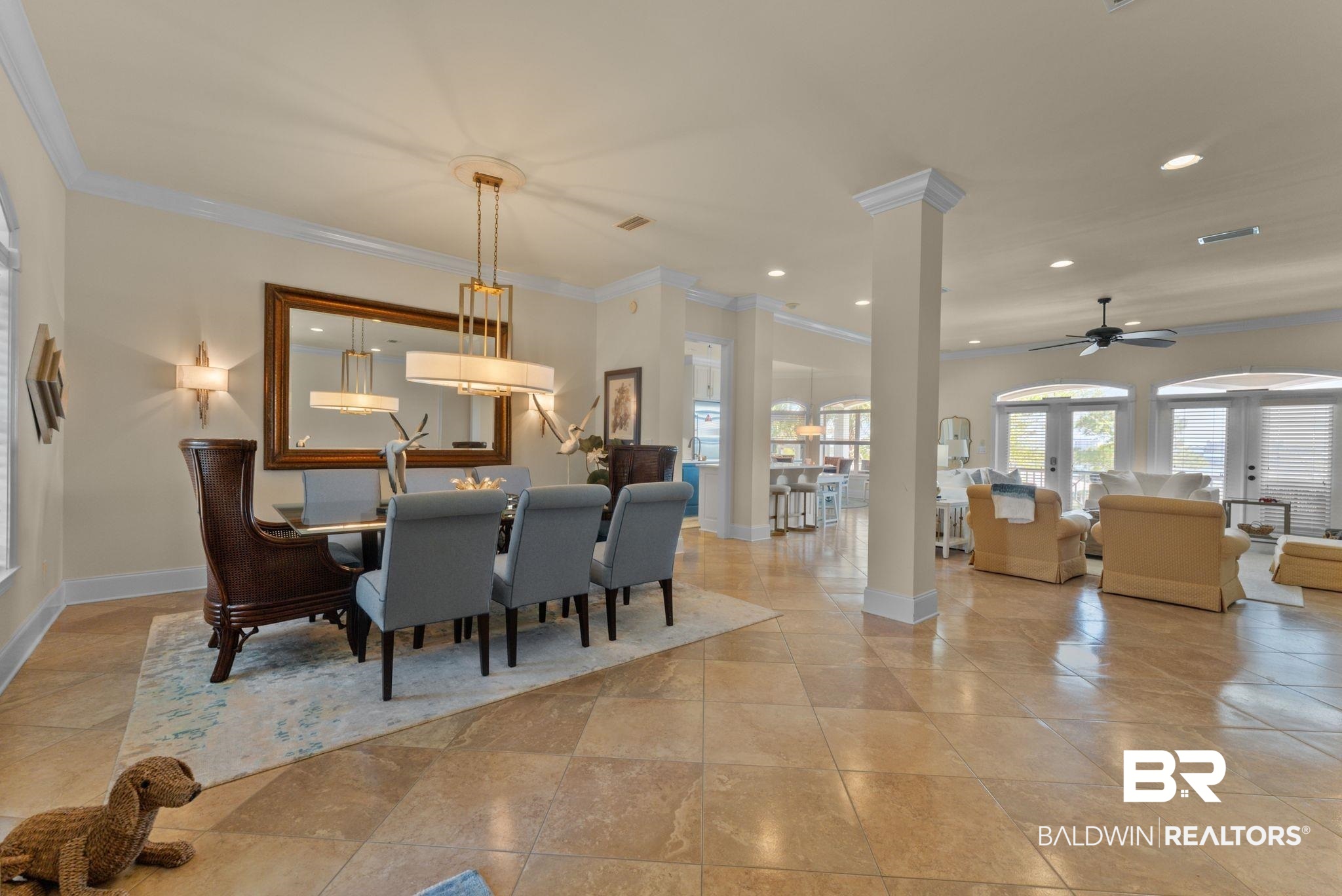 30818 River Road Orange Beach, AL 36561 - Photo 14 of 81 Dining space featuring crown molding, a ceiling fan, and recessed lighting