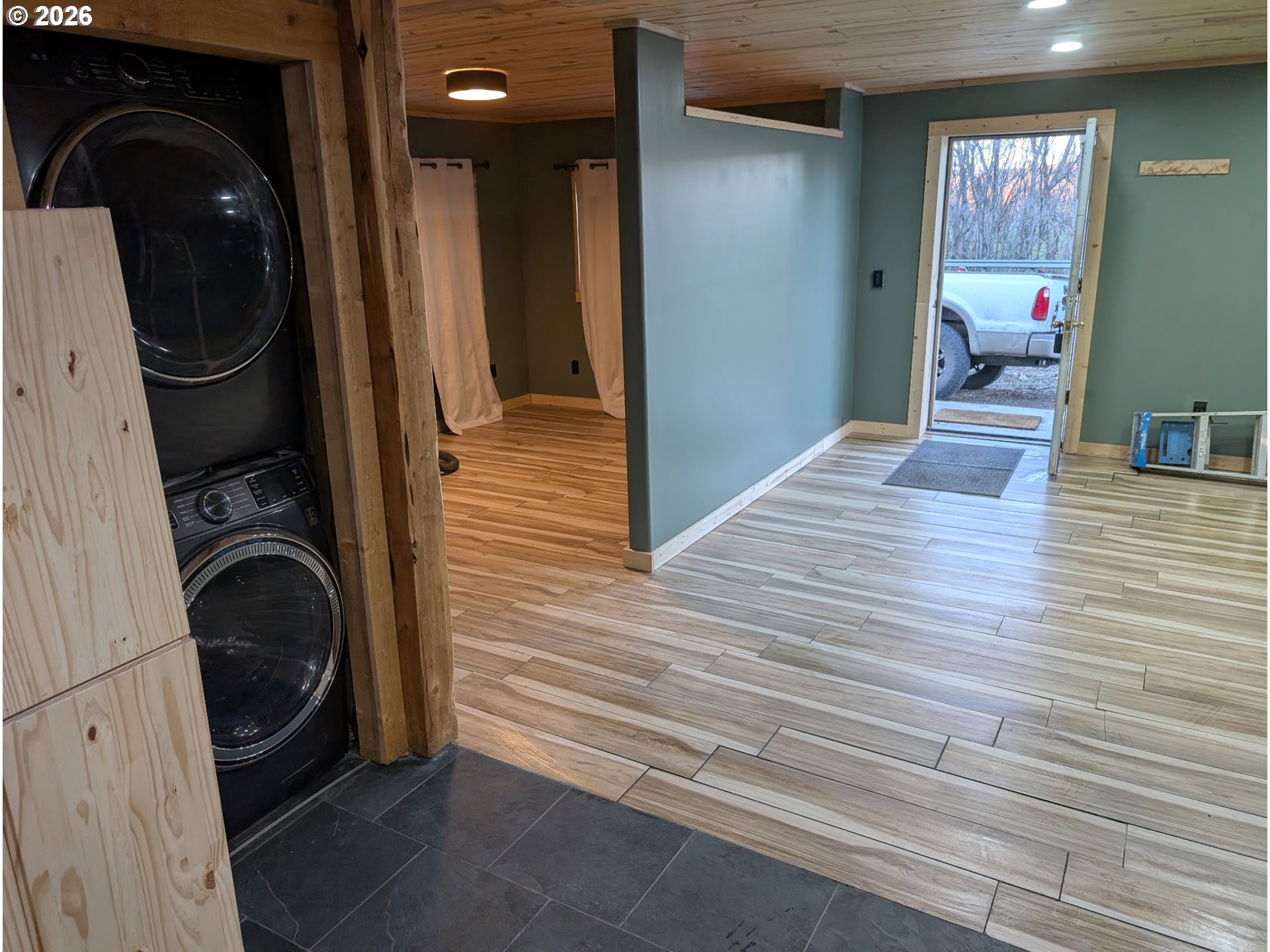 44786 Mission Road Pendleton, OR 97801 - Photo 13 of 19 a view of a hallway with washer and dryer