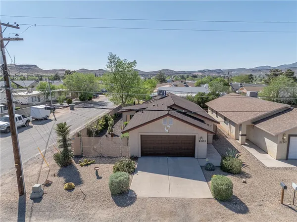 a aerial view of a house with a garden