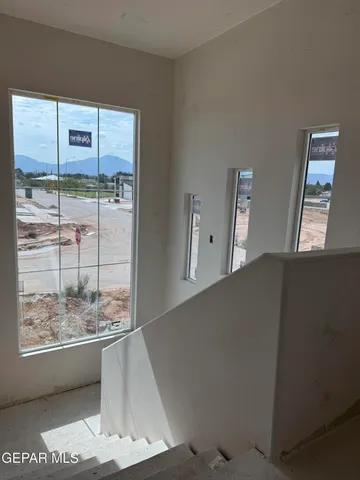 a view of a living room and window