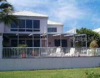 3532 Mistletoe 00000 Longboat Key, FL 34228 - Photo 1 of 1 a view of a house with a deck