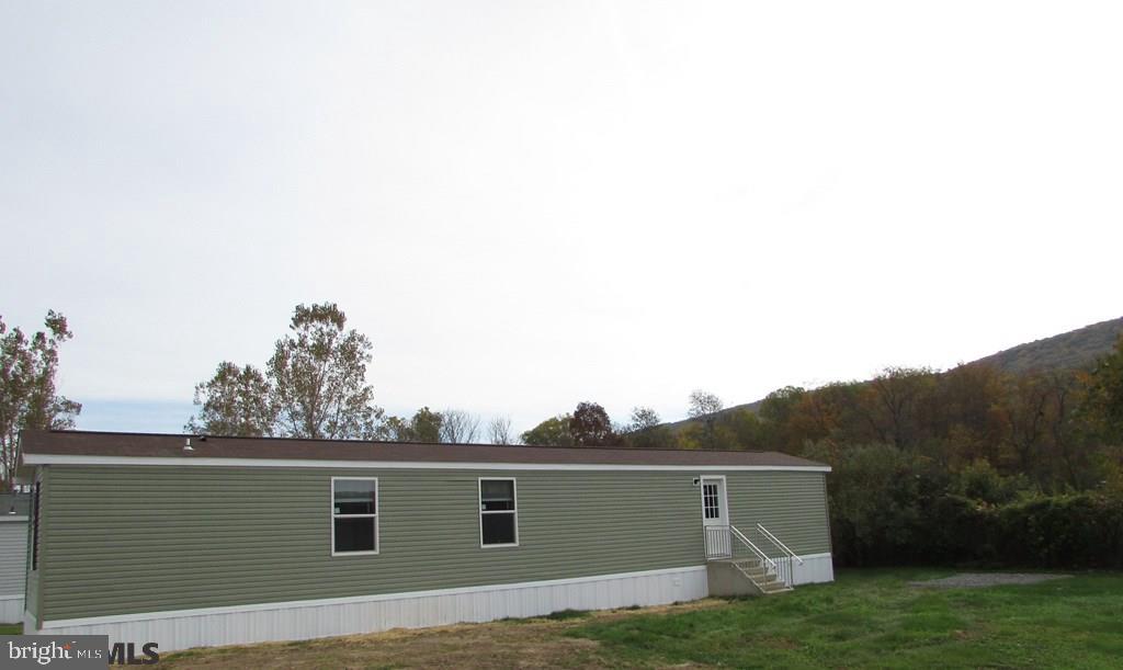 382 Hawk Lane Julian, PA 16844 - Photo 14 of 16 a view of house with a big yard