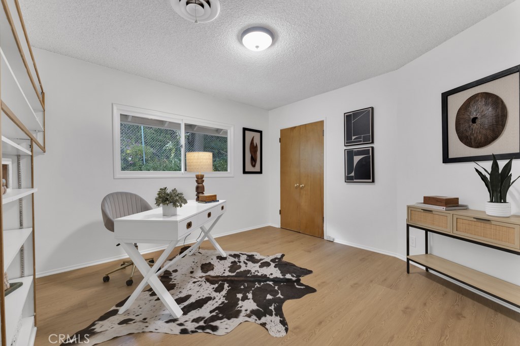 4775 Regalo Road Woodland Hills, CA 91364 - Photo 30 of 42 a living room with furniture