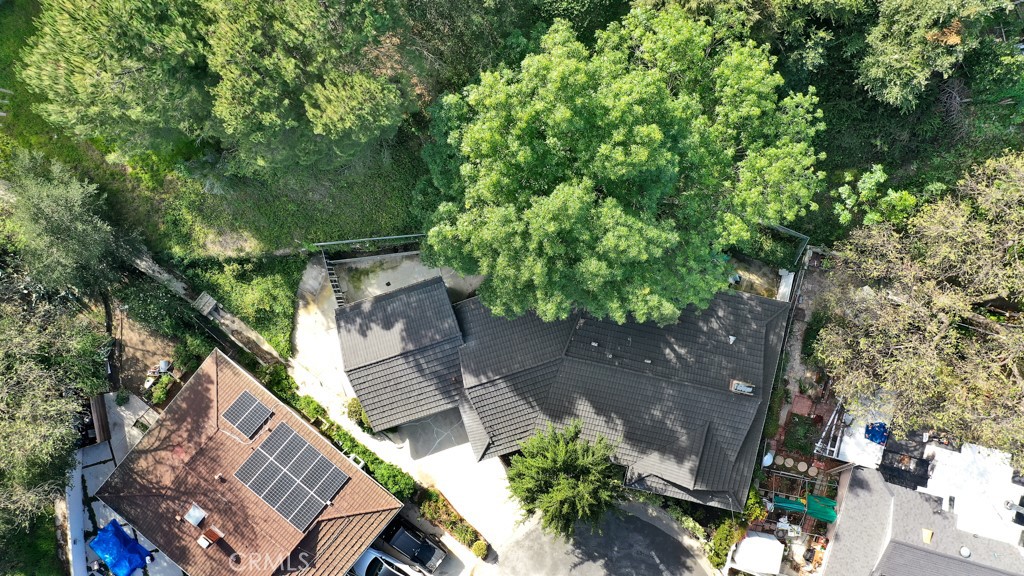 4775 Regalo Road Woodland Hills, CA 91364 - Photo 38 of 42 an aerial view of a house with a yard