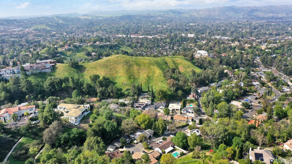 4775 Regalo Road Woodland Hills, CA 91364 - Photo 41 of 42 an aerial view of residential house and lake view