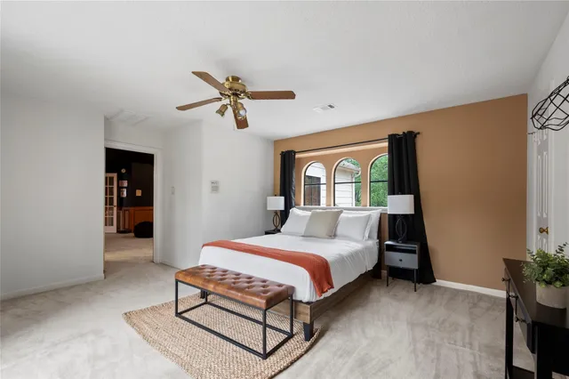 a bathroom with double sink and a mirror