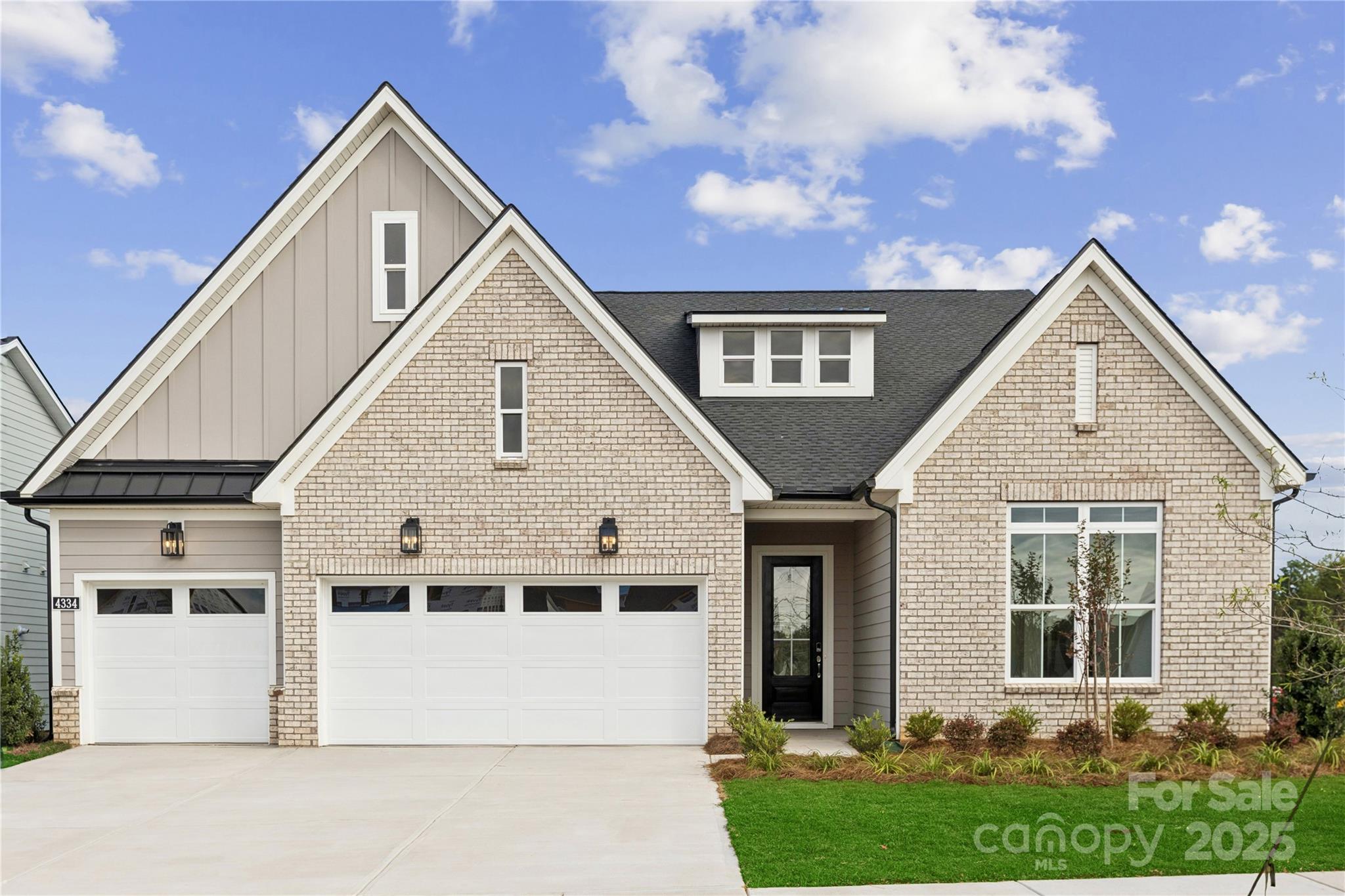 4334 Durango Drive, Unit 265 Indian Land, SC 29707 - Photo 1 of 28 a view of a white house next to a yard
