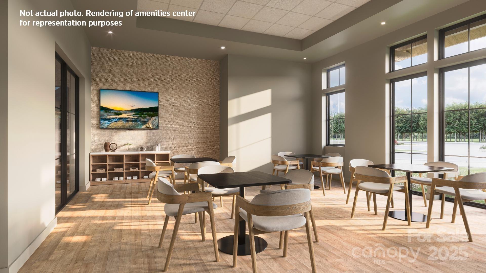 4334 Durango Drive, Unit 265 Indian Land, SC 29707 - Photo 22 of 28 a dining room with furniture and large windows