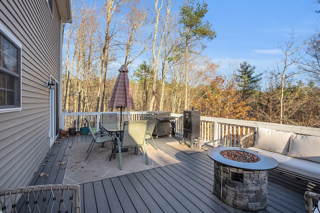 261 Bean Porridge Hill Road Westminster, MA 01473 - Photo 14 of 33 a view of a chairs and table on the roof deck