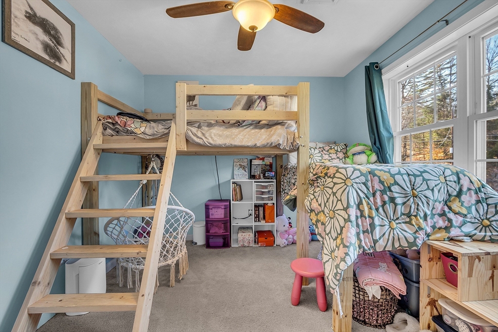 261 Bean Porridge Hill Road Westminster, MA 01473 - Photo 18 of 33 a bedroom with furniture and a large window