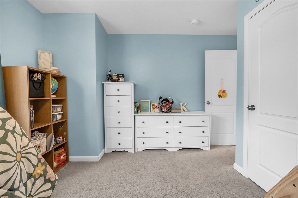 261 Bean Porridge Hill Road Westminster, MA 01473 - Photo 19 of 33 a bed room with a bed and a cabinets
