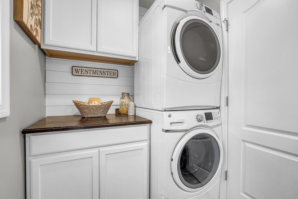 261 Bean Porridge Hill Road Westminster, MA 01473 - Photo 29 of 33 a view of a hallway with washer and dryer