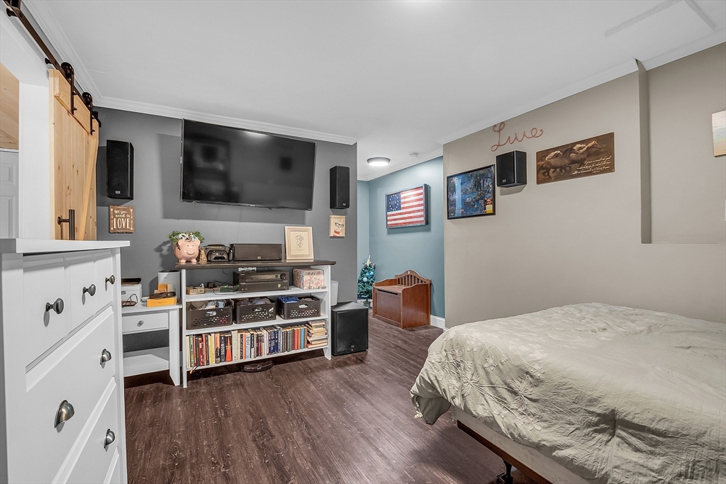 261 Bean Porridge Hill Road Westminster, MA 01473 - Photo 31 of 33 a bedroom with furniture and a flat screen tv