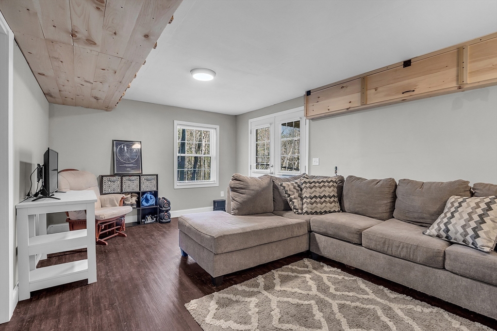 261 Bean Porridge Hill Road Westminster, MA 01473 - Photo 32 of 33 a living room with furniture window and wooden floor