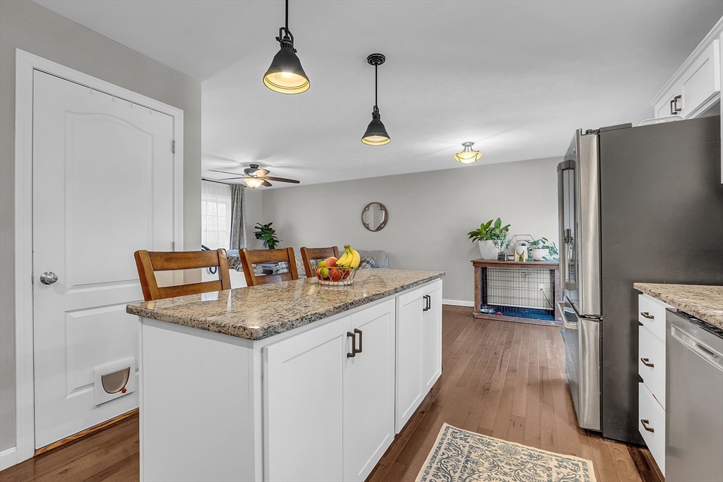 261 Bean Porridge Hill Road Westminster, MA 01473 - Photo 7 of 33 a kitchen with stainless steel appliances granite countertop a sink a refrigerator and a stove