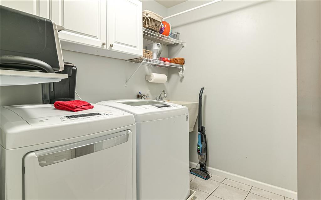 216 Sycamore Drive Seven Fields, PA 16046 - Photo 15 of 25 a utility room with dryer and washer