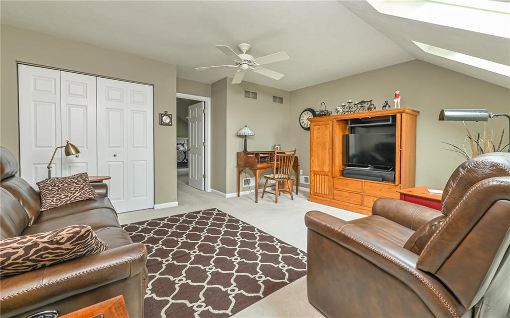 216 Sycamore Drive Seven Fields, PA 16046 - Photo 16 of 25 a living room with furniture and a large window