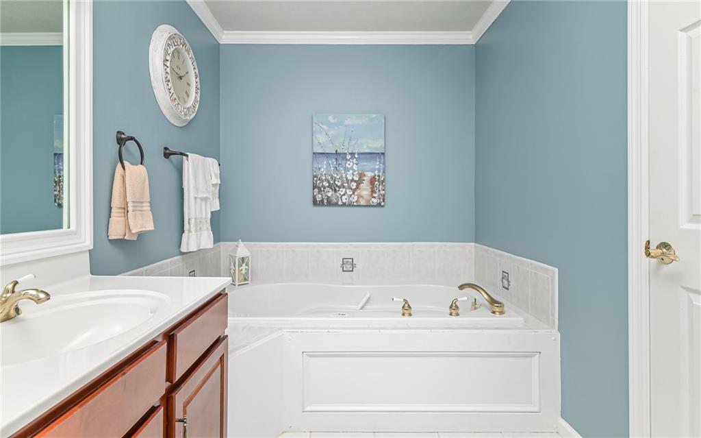 216 Sycamore Drive Seven Fields, PA 16046 - Photo 20 of 25 a bathroom with a bathtub and a sink