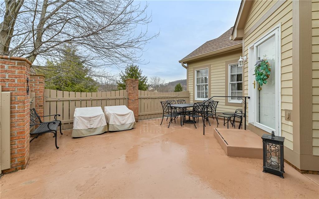 216 Sycamore Drive Seven Fields, PA 16046 - Photo 21 of 25 a view of a patio with dining table and chairs
