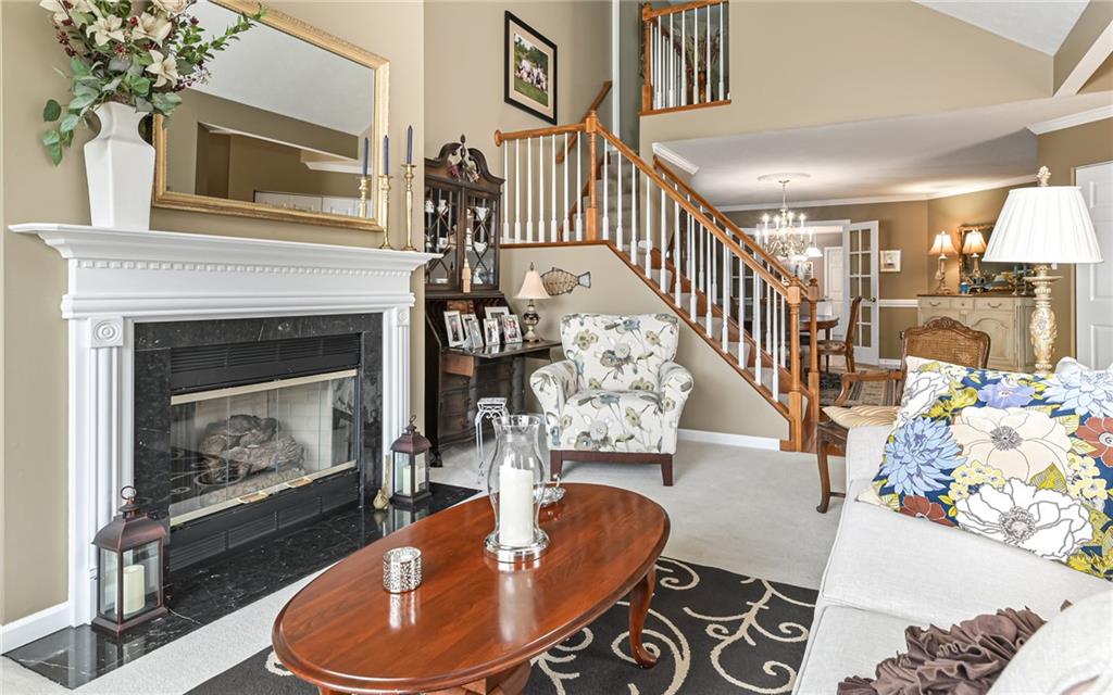 216 Sycamore Drive Seven Fields, PA 16046 - Photo 6 of 25 a living room with furniture and a fireplace