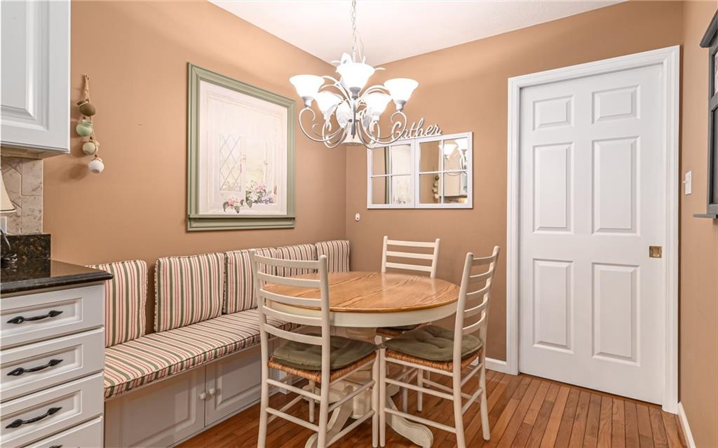 216 Sycamore Drive Seven Fields, PA 16046 - Photo 10 of 25 a view of a dining room with furniture and chandelier