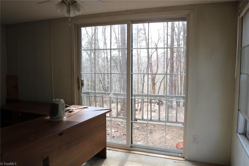 691 Epperson Church Road Mount Airy, NC 27030 - Photo 15 of 20 Bedroom with sliding glass doors