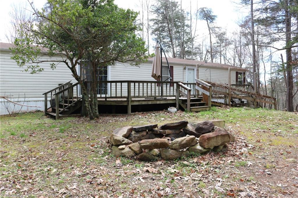 691 Epperson Church Road Mount Airy, NC 27030 - Photo 4 of 20 Front view/fire pit