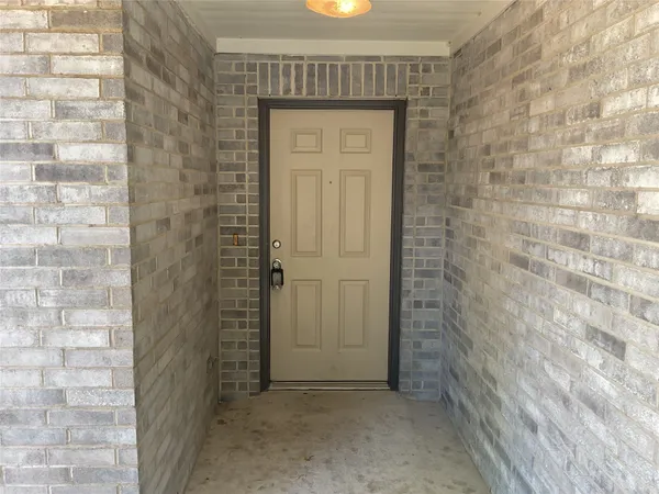 a view of entryway with a hallway