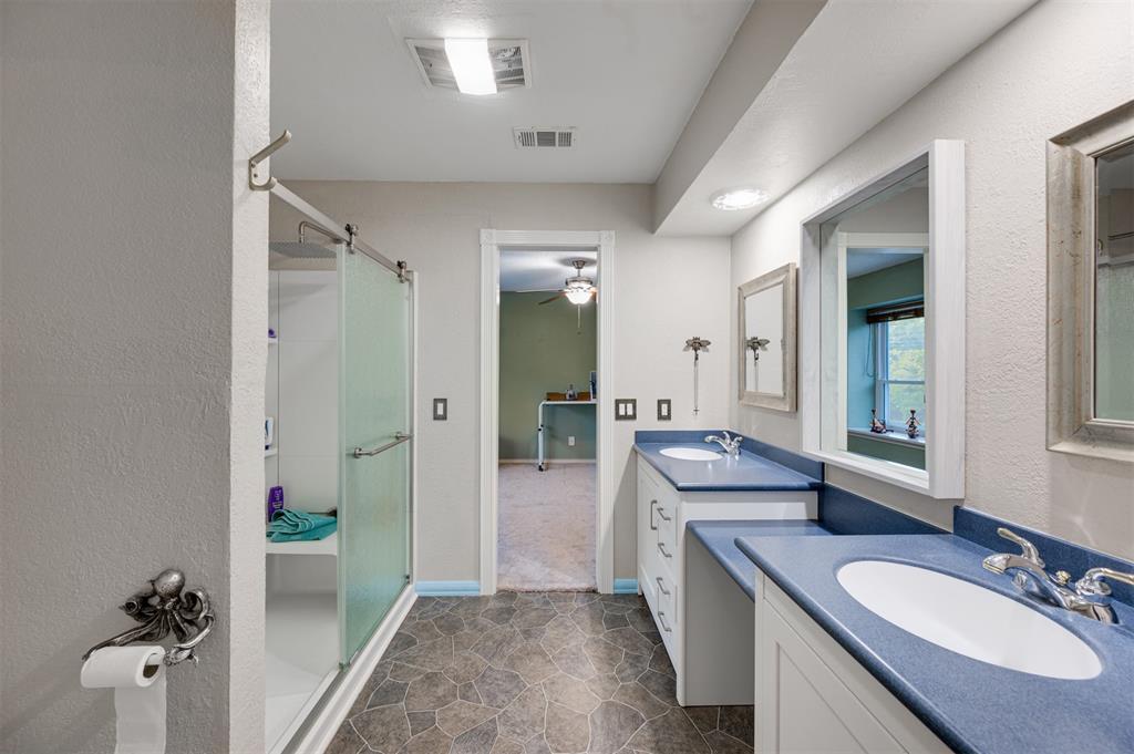 4115 Alpine Street Paris, TX 75462 - Photo 28 of 40 Jack and Jill bath with shower and separate sinks