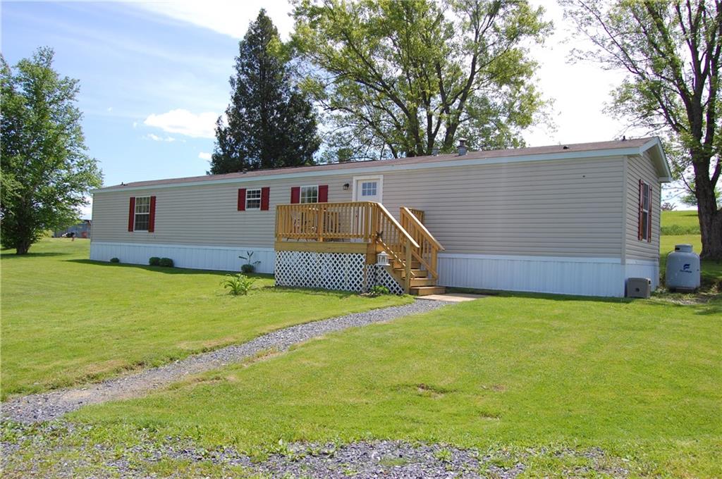4053 Pioneer Lake Road Cherry Tree, PA 15724 - Photo 1 of 20 a front view of house with yard and garage