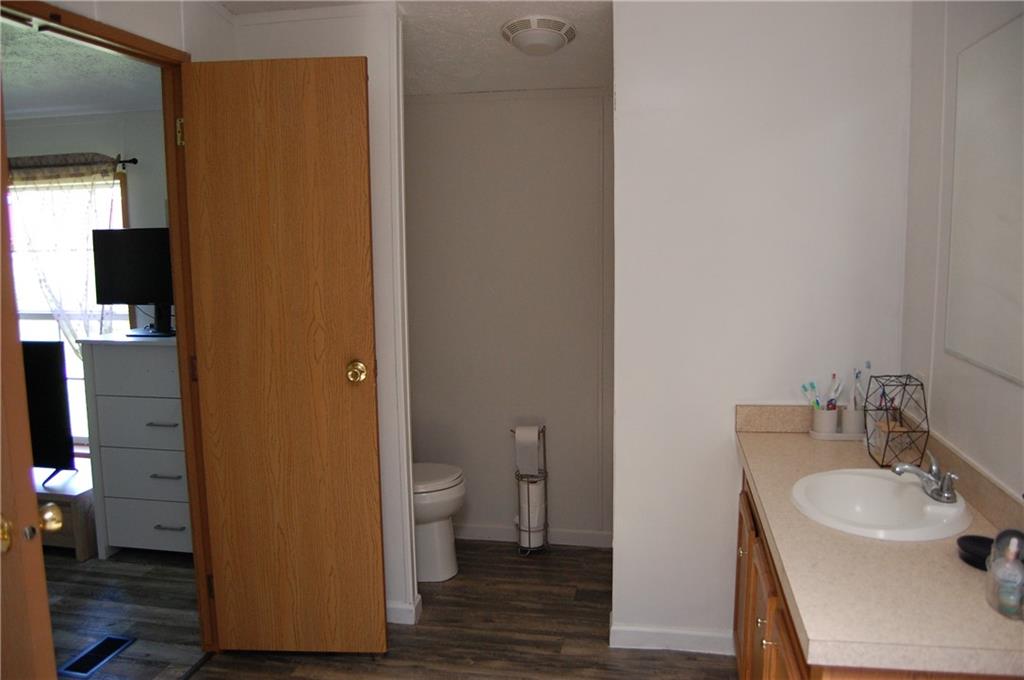 4053 Pioneer Lake Road Cherry Tree, PA 15724 - Photo 11 of 20 a bathroom with a sink and a mirror