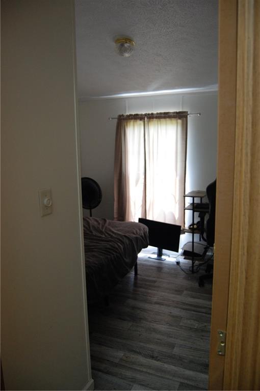 4053 Pioneer Lake Road Cherry Tree, PA 15724 - Photo 14 of 20 a bedroom with a bed and a window